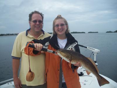 Jenn and her dad Scott with a  nice slot fish